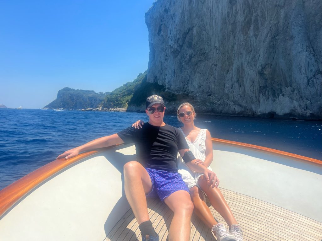 on a boat in capri in our swimsuits and coverups